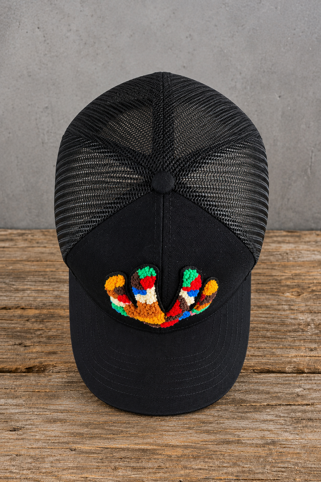 top view The Onyx Collection Statement NY Chenille Hat with oversized multicolor chenille NY patch on black cap