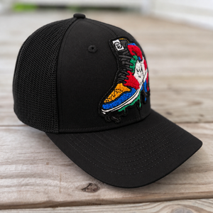 side view The Onyx Collection Chenille Rebel Sneaker black hat with handcrafted patchwork