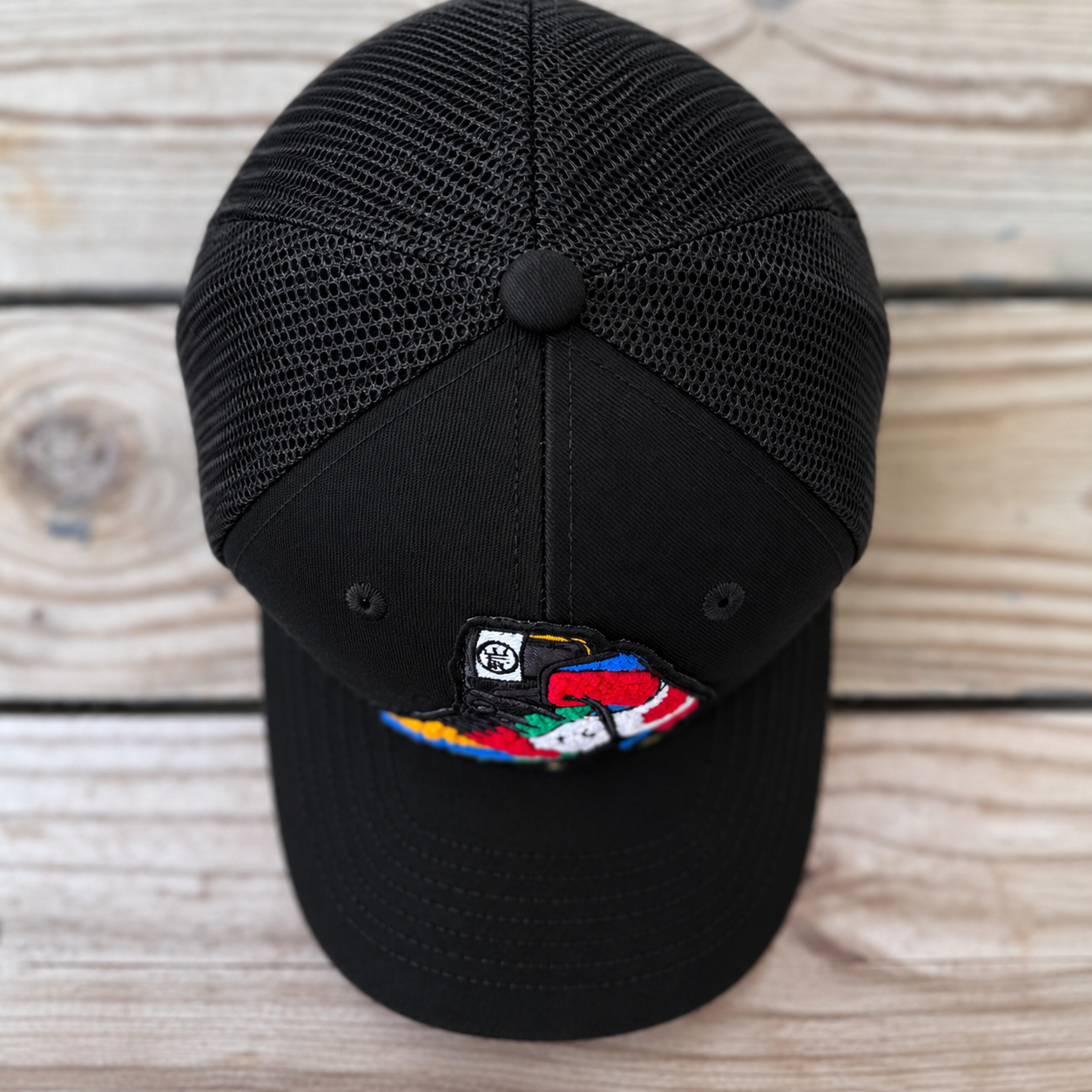 top view The Onyx Collection Chenille Rebel Sneaker black hat with handcrafted patchwork