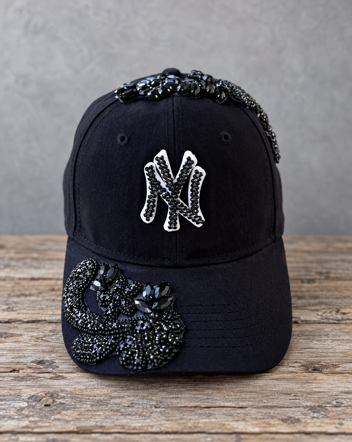 Black Crystal Appliqué Black New York Hat with hand-applied black crystal design