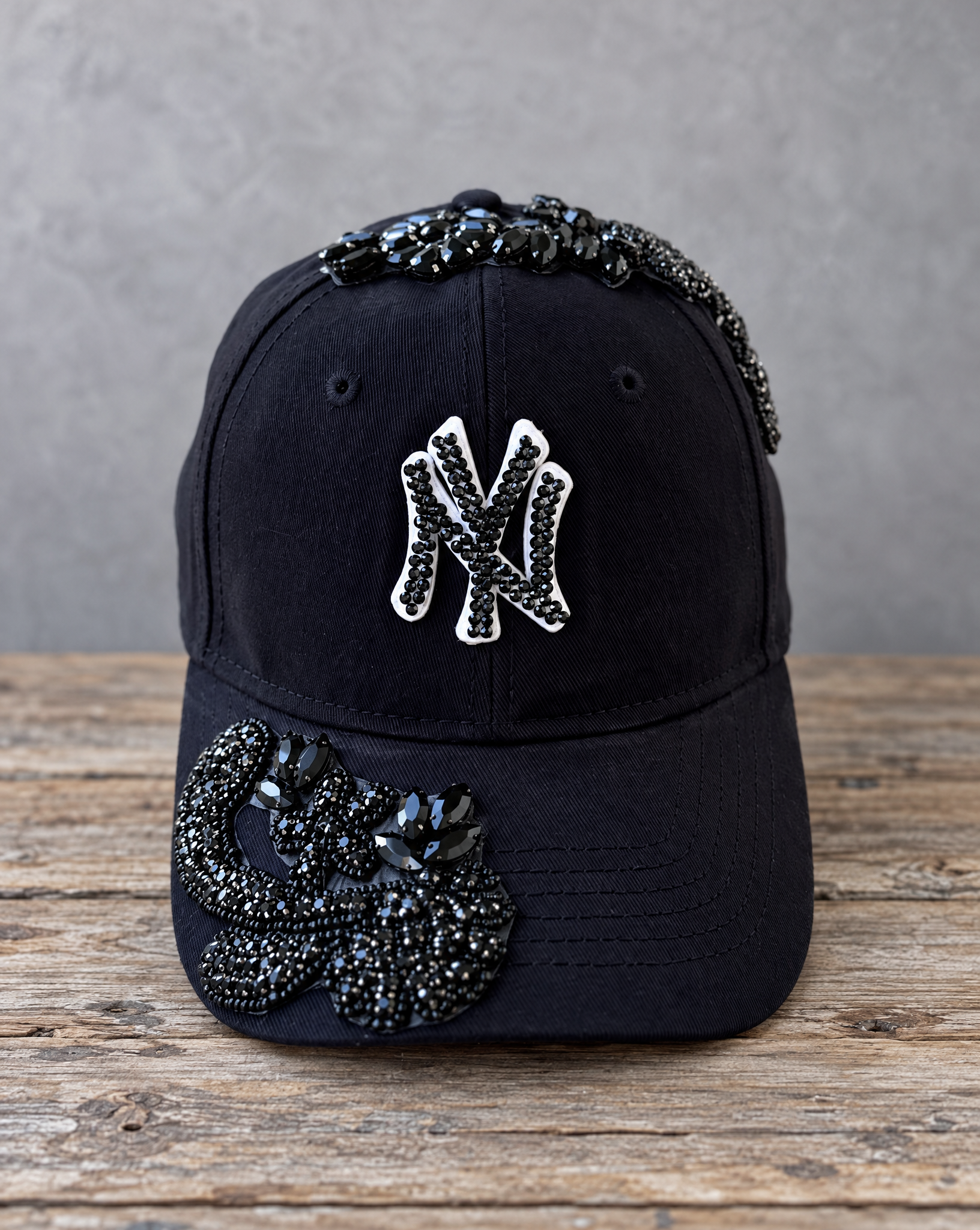 Black Crystal Appliqué Black New York Hat with hand-applied black crystal design