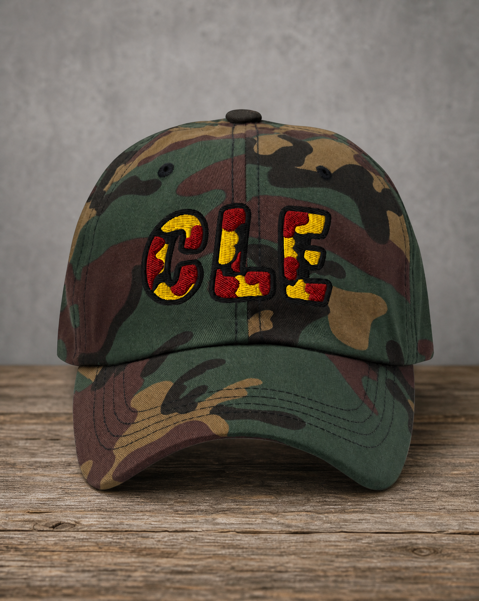 The City Collection CLE Basketball camo hat with oversized embroidered lettering