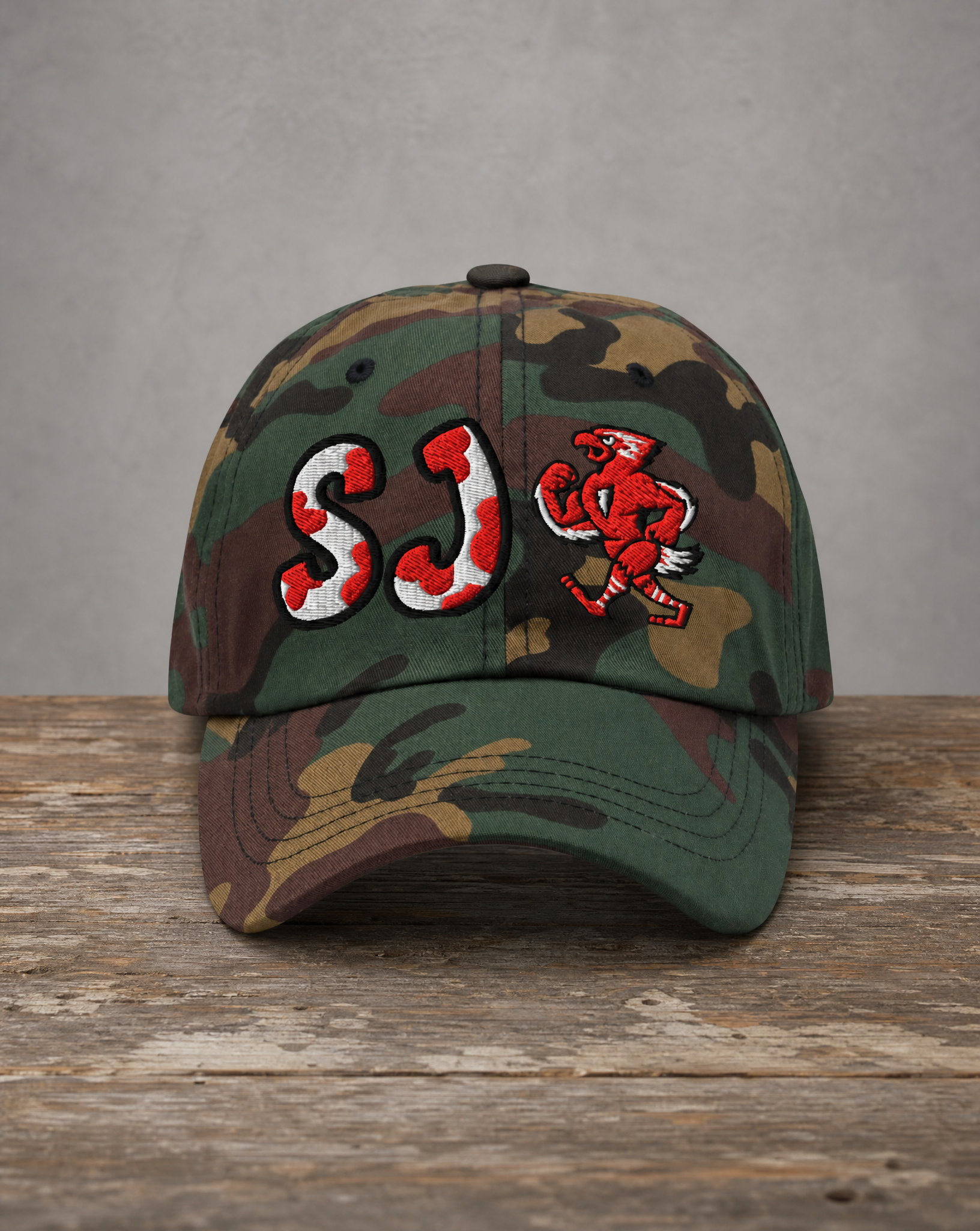 The City Collection St. John’s college camo hat with oversized embroidered lettering