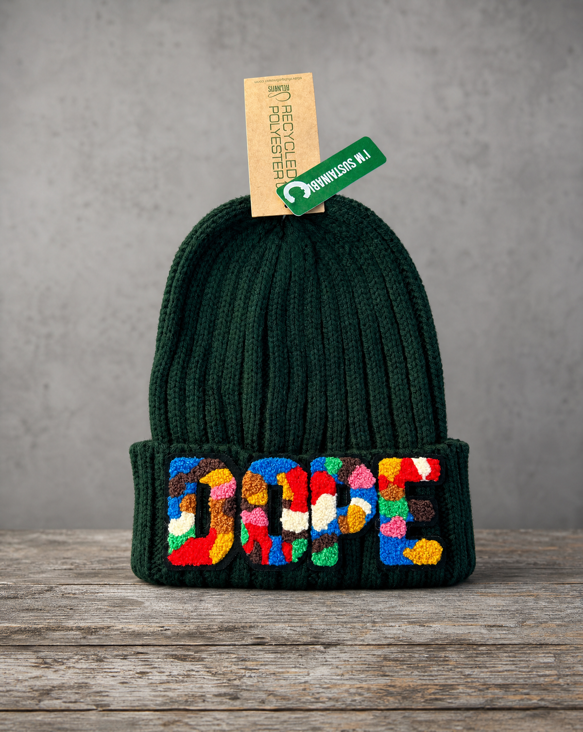 Sustainable knit beanie featuring a handcrafted chenille DOPE patch