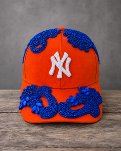 Blue Crystal Appliqué Orange New York Hat with hand-sewn blue crystal design