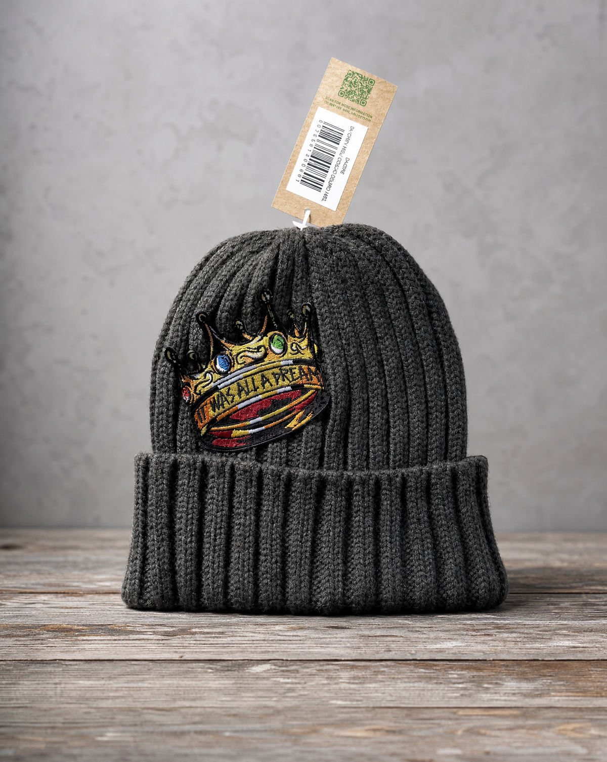 Sustainable cable knit beanie featuring a handcrafted It Was All a Dream patch