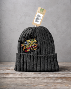 Sustainable cable knit beanie featuring a handcrafted It Was All a Dream patch