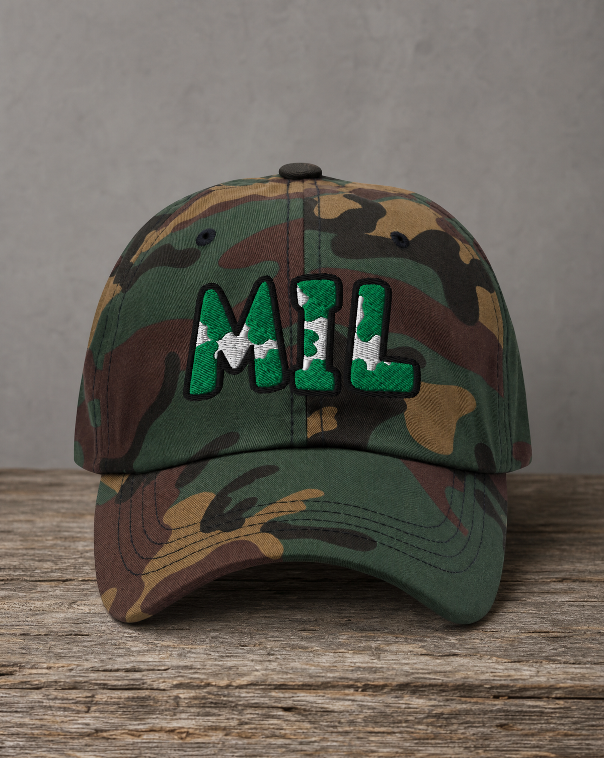 The City Collection MIL Basketball camo hat with oversized embroidered lettering