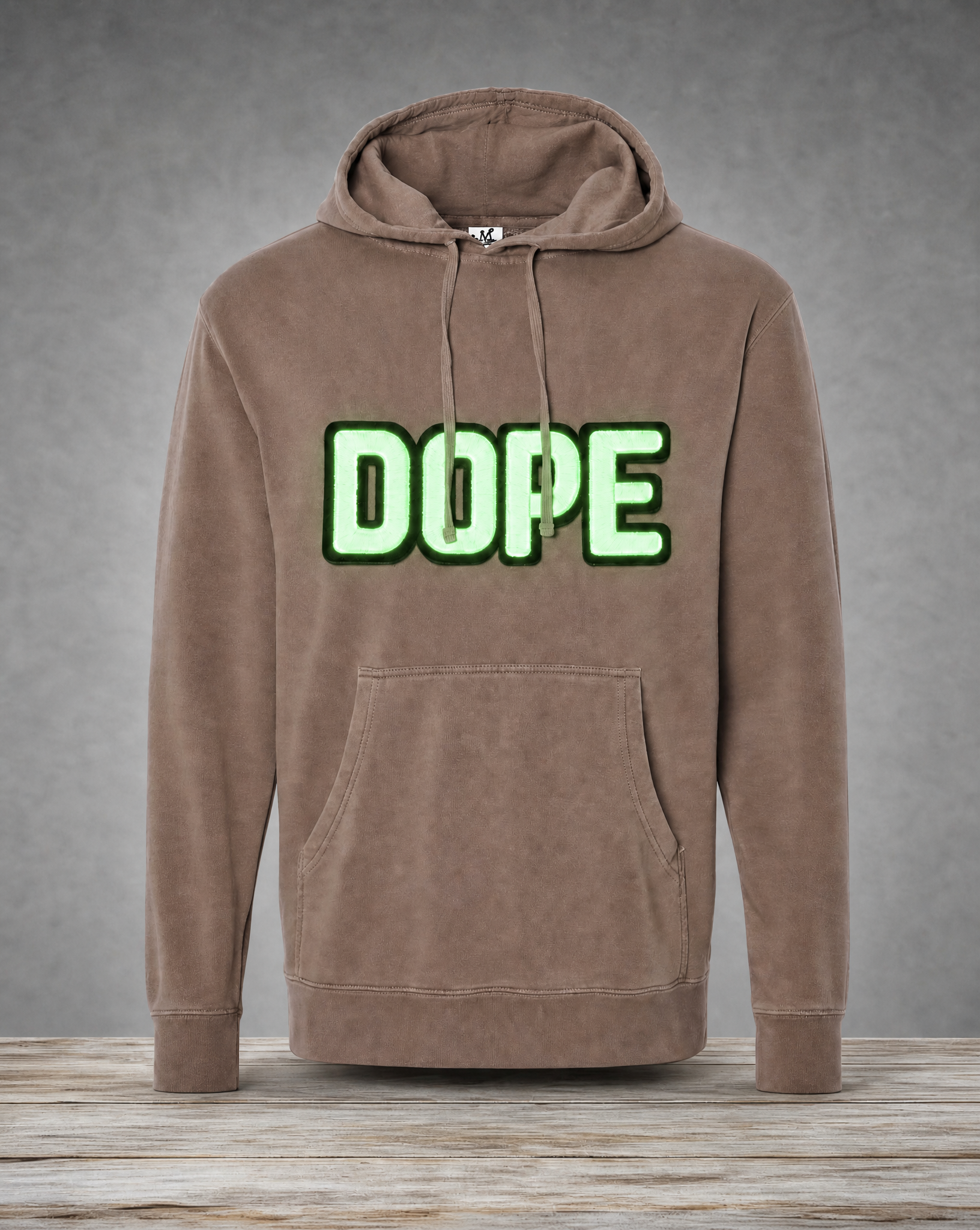 Glowing  brown hoodie featuring a handcrafted glow-in-the-dark DOPE patch