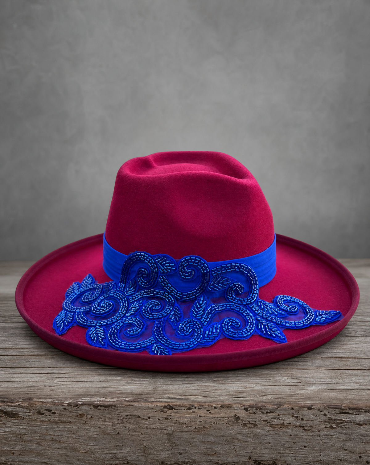 Blue fedora hat featuring a handcrafted crystal appliqué LOVE design