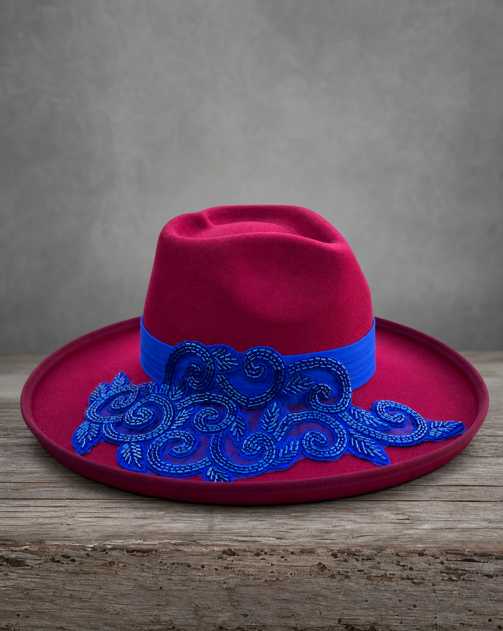 Blue fedora hat featuring a handcrafted crystal appliqué LOVE design
