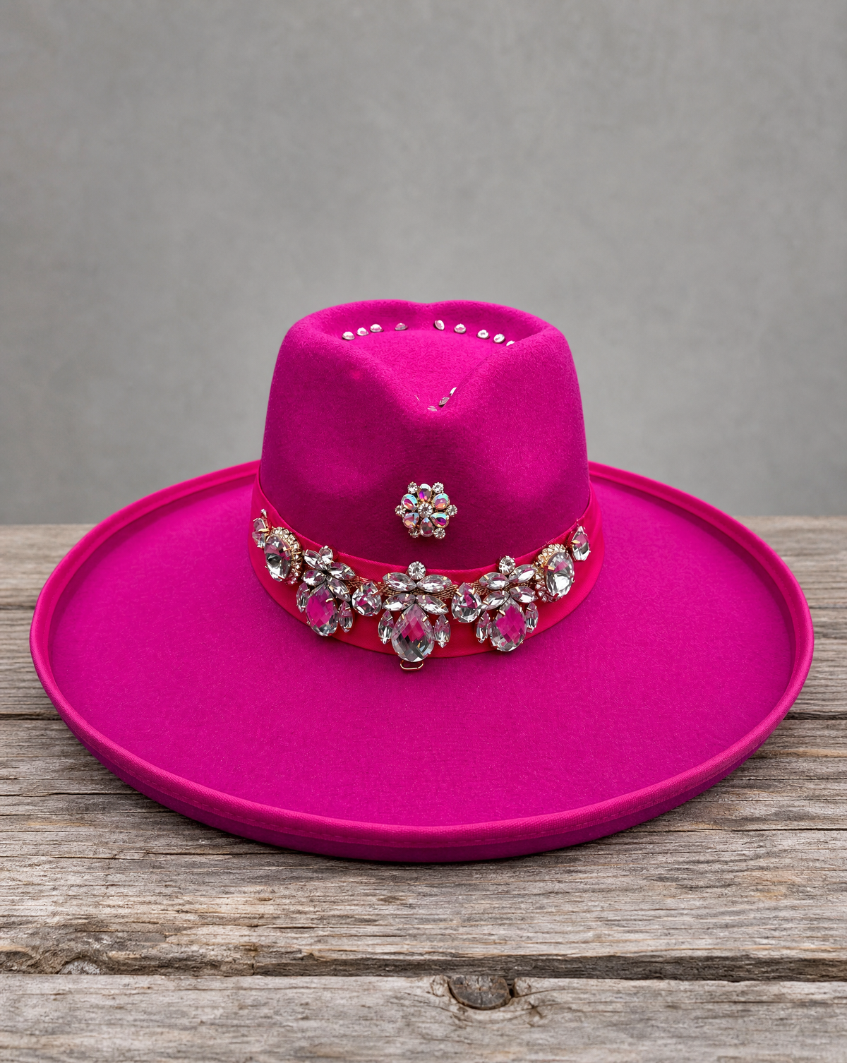 Pink fedora hat featuring a handcrafted crystal appliqué heart design