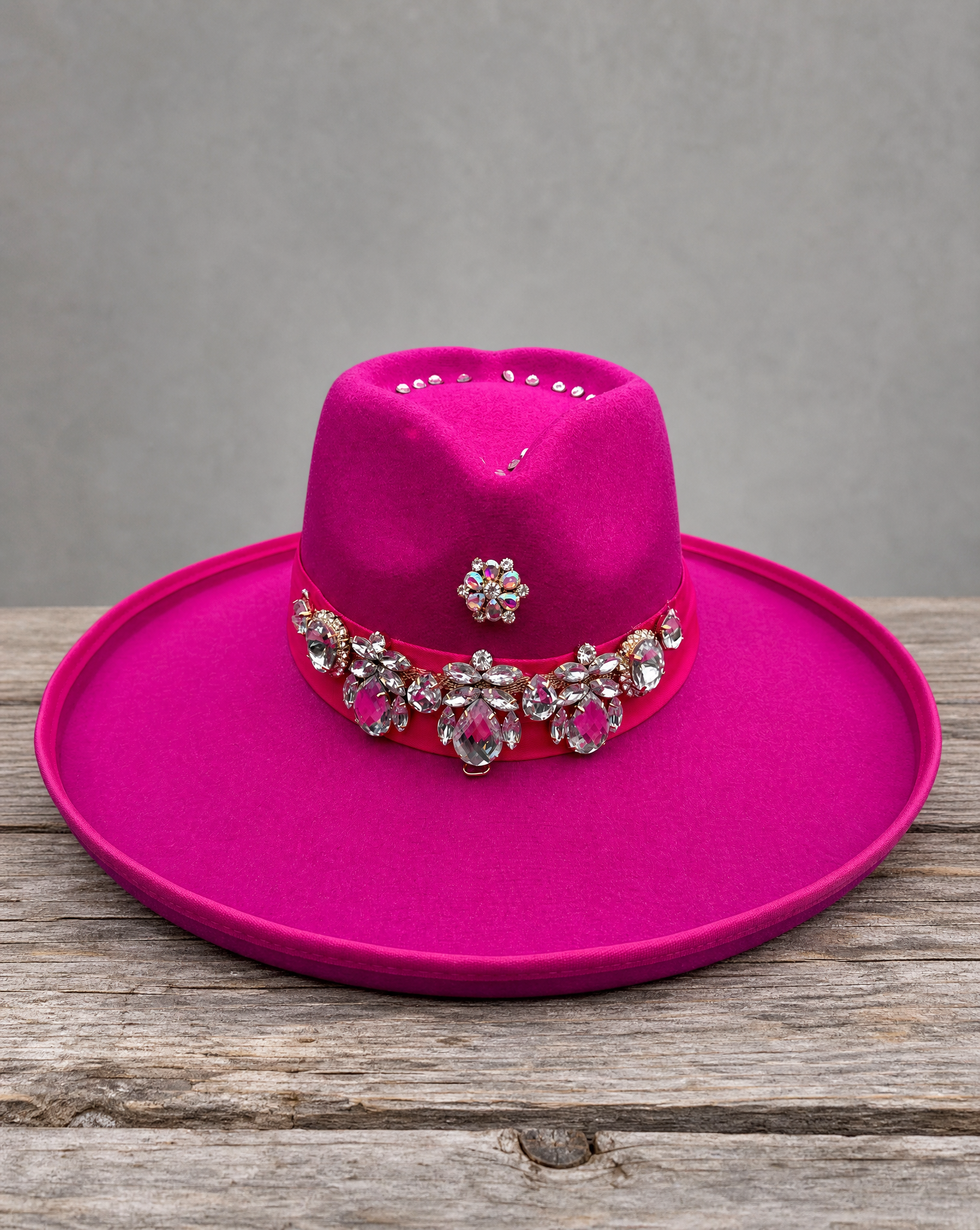 Pink fedora hat featuring a handcrafted crystal appliqué heart design