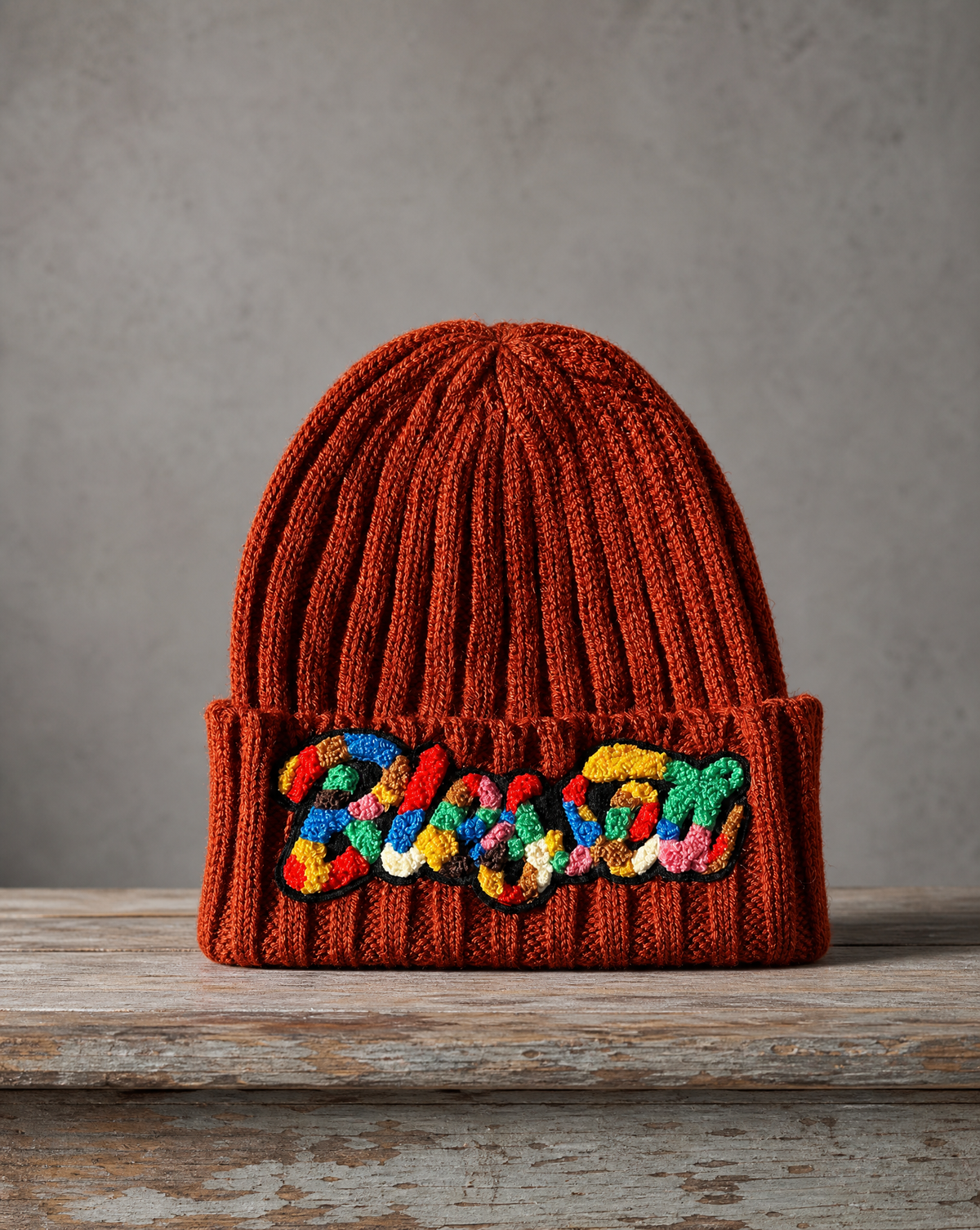 Cable knit beanie featuring a handcrafted chenille Blessed patch