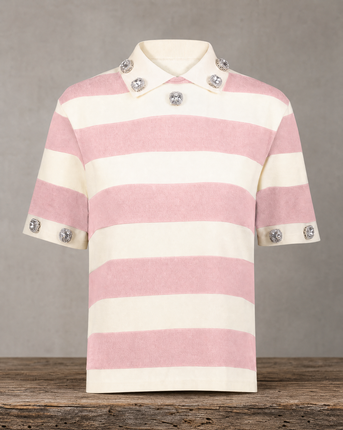 The Manhattan Jeweled Pink Polo with oversized crystal embellishments on the collar and sleeves
