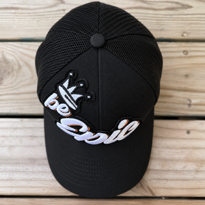 Top view The Onyx Collection Be EPIC black hat with bold handcrafted patchwork