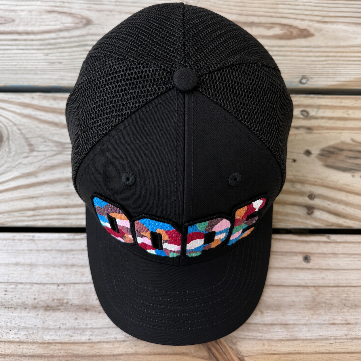 top view The Onyx Collection Glow in the Dark DOPE black hat with bold handcrafted lettering