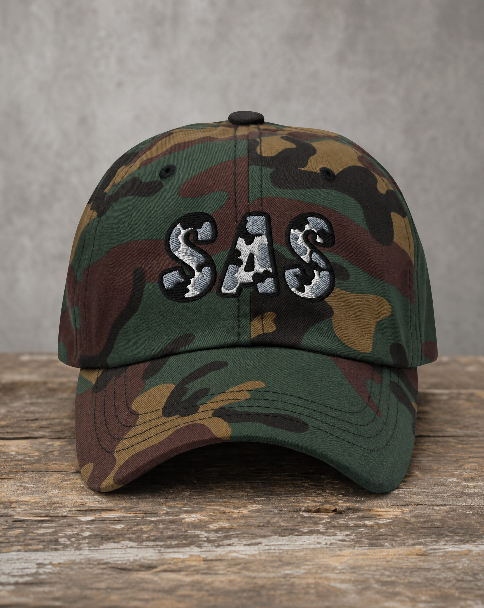 The City Collection SAS Basketball camo hat with oversized embroidered lettering