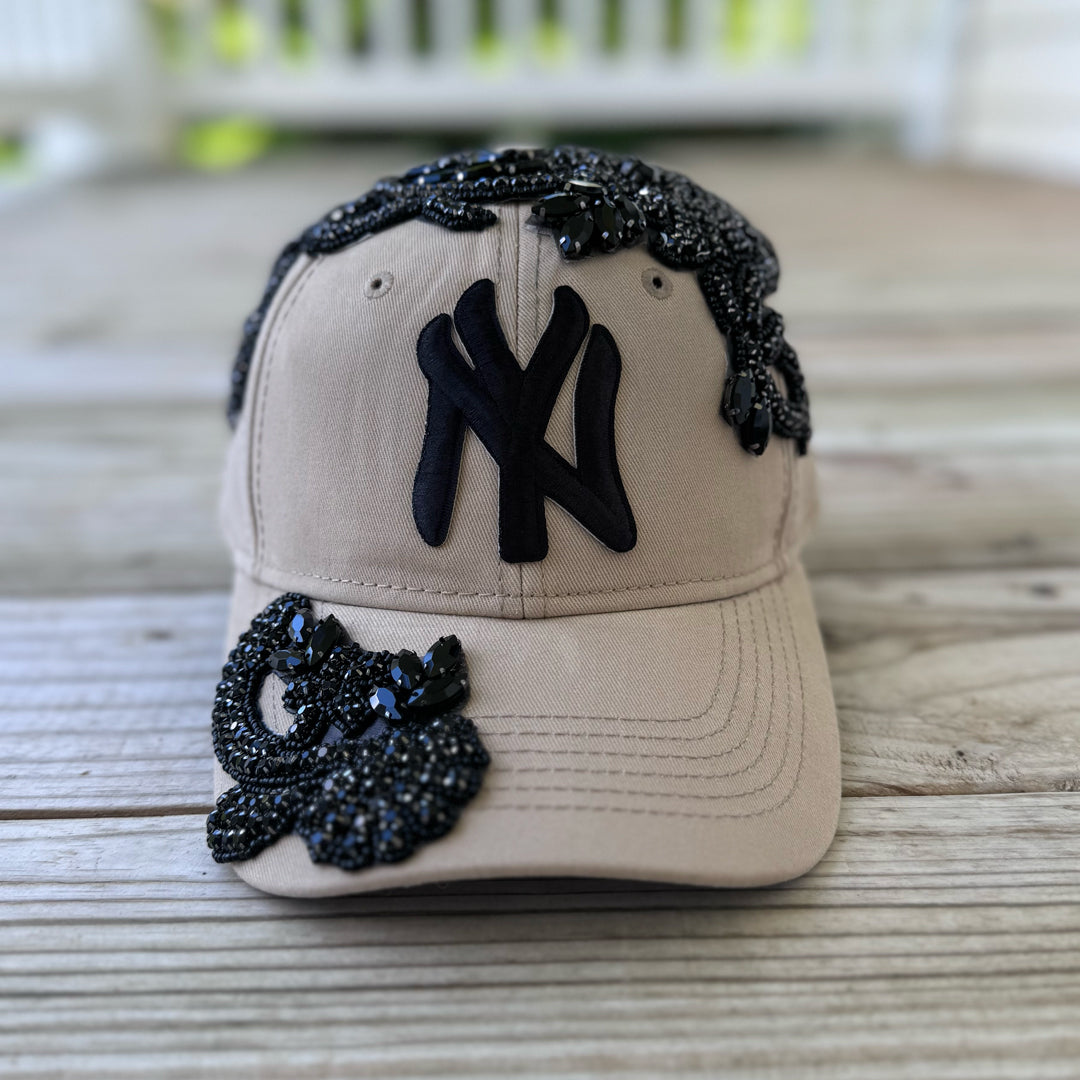 Front view of Black Crystal Appliqué Big New York Hat with hand-applied black crystals