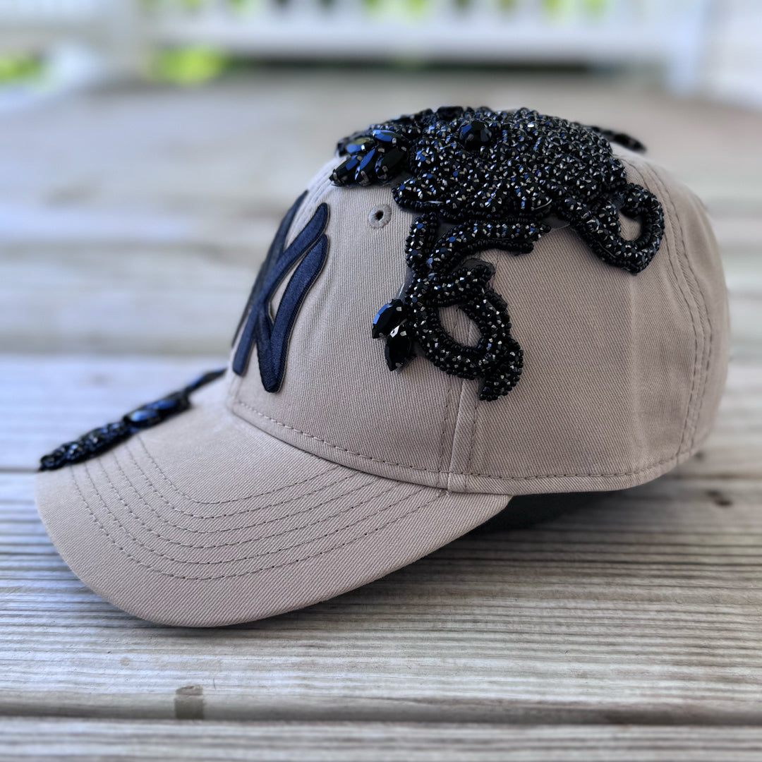 Right-side view of Black Crystal Appliqué Big New York Hat with hand-applied black crystals