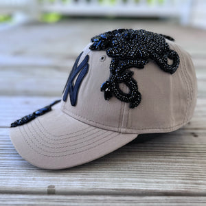 Right-side view of Black Crystal Appliqué Big New York Hat with hand-applied black crystals