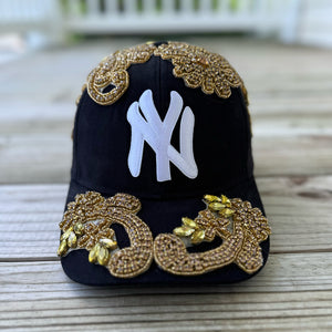 Gold Crystal Appliqué Black New York Hat with hand-applied gold crystal design