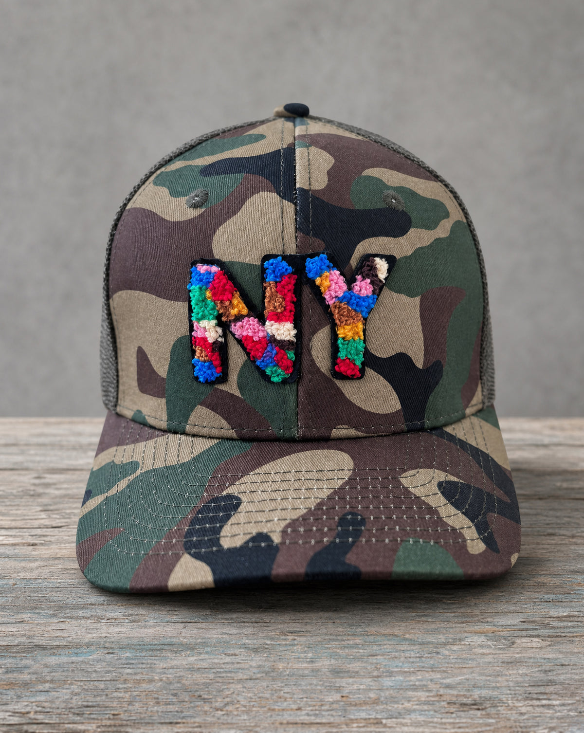 The City Collection NY chenille camo hat with handcrafted chenille design