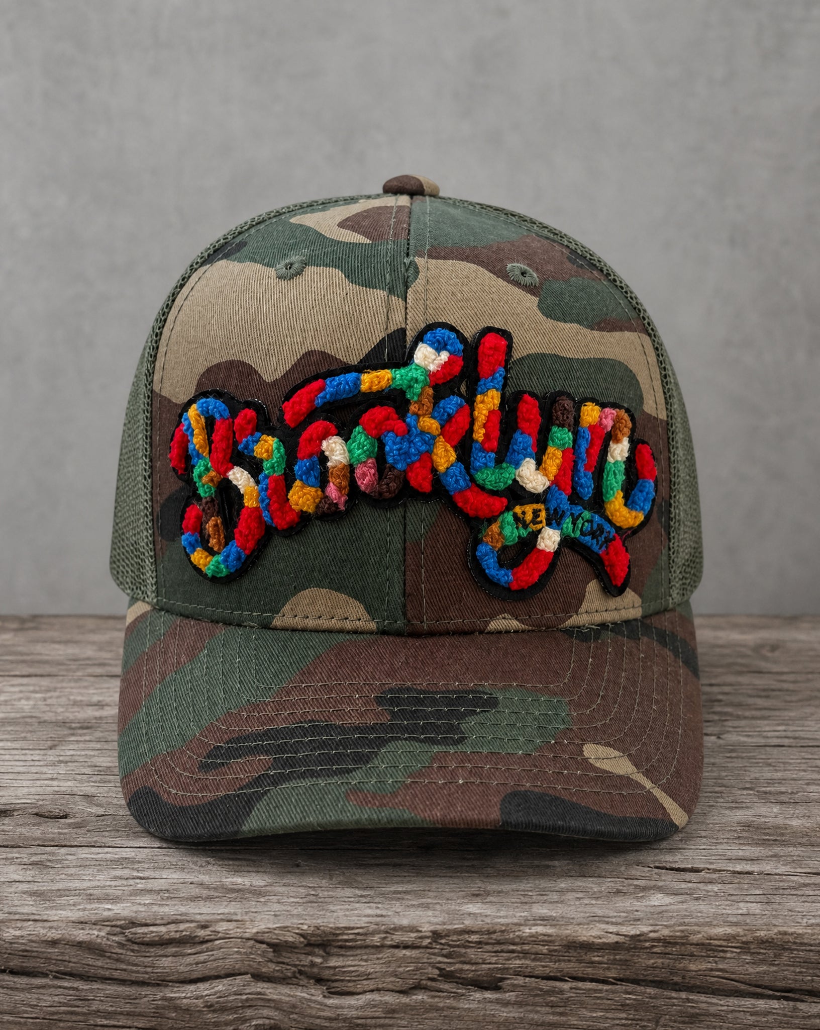 Handcrafted Brooklyn chenille camo hat from The City Collection featuring premium chenille detailing and iconic New York streetwear style from Believe In New York.