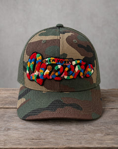 The City Collection Queens chenille camo hat with handcrafted chenille design