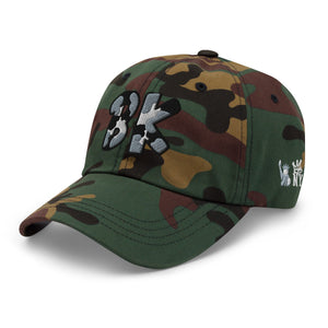 side view The City Collection BK Basketball camo hat with oversized gray and black embroidered lettering