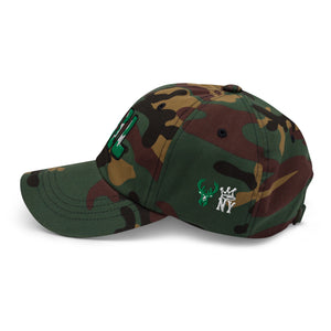 side view The City Collection MIL Basketball camo hat with oversized embroidered lettering
