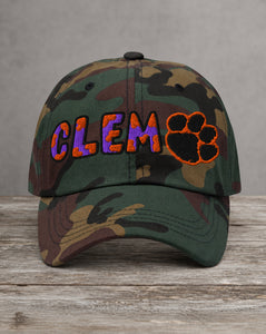 Hand-drawn CLEM camo patched hat with orange paw print appliqué, handcrafted City Collection by Believe In New York