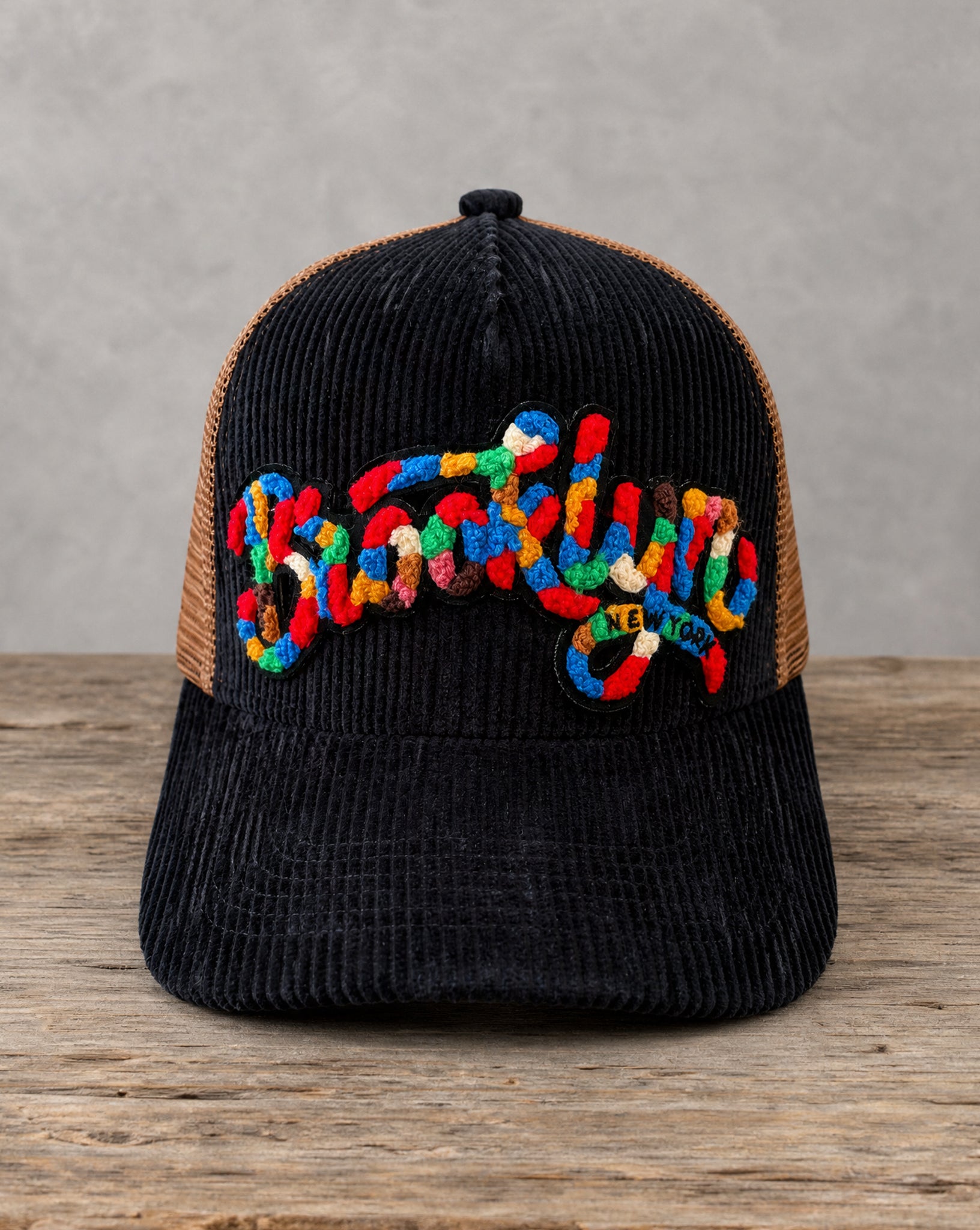 The City Collection Brooklyn chenille corduroy trucker hat with handcrafted chenille design
