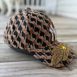 side Limited Edition NY Gold Crystal Appliqué Hat with handcrafted gold crystal details