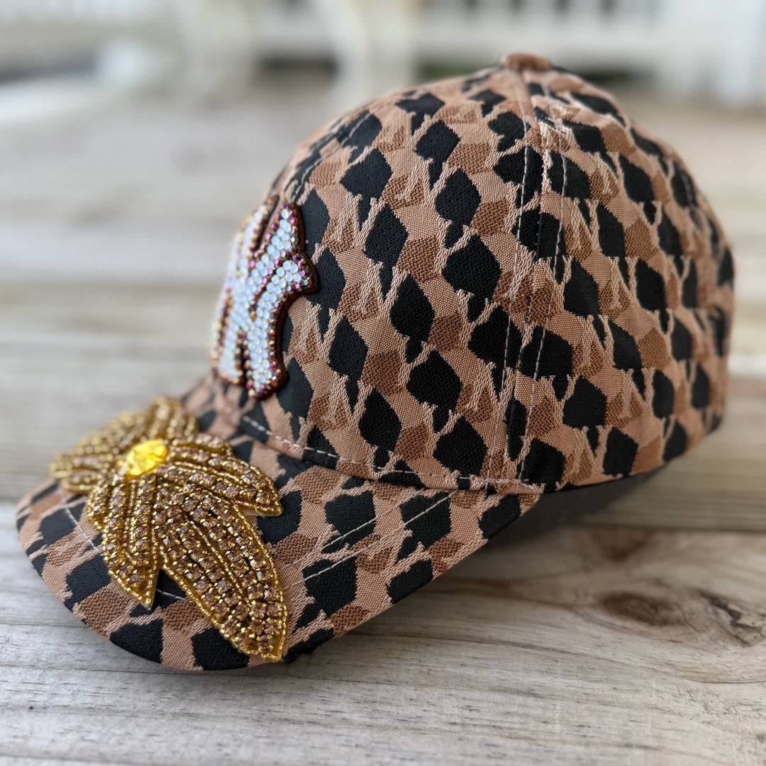 side Limited Edition NY Gold Crystal Appliqué Hat with handcrafted gold crystal details