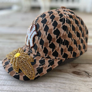 side Limited Edition NY Gold Crystal Appliqué Hat with handcrafted gold crystal details