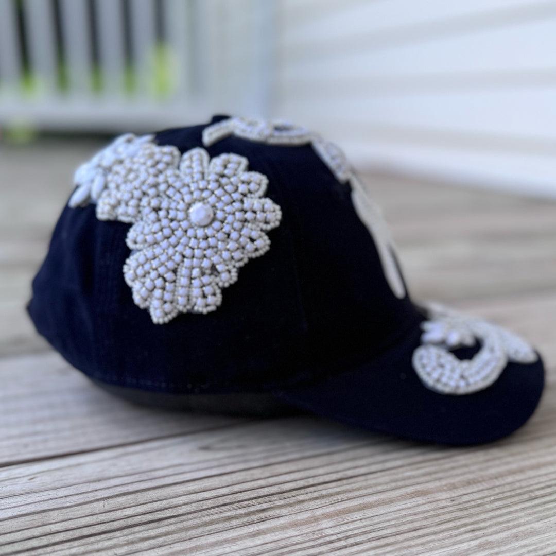 Left-side view of Custom Beaded White Crystal Applique Navy New York Hat