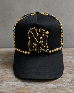 Black and gold pearl crystal appliqué New York hat with handcrafted embellishments