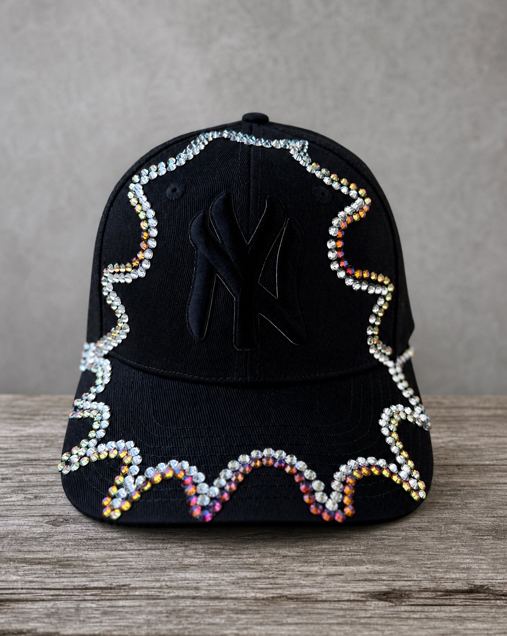 Chameleon Crystal Appliqué Bow New York Hat with iridescent crystal detailing