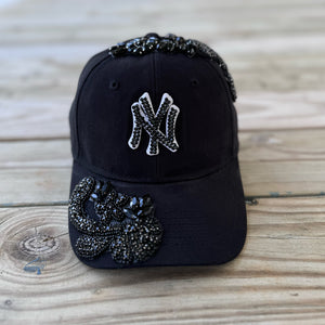Black Crystal Appliqué Black New York Hat with hand-applied black crystal design