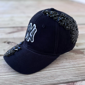 Right-side view of Black Crystal Appliqué Black New York Hat
