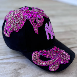 Left-side view of Pink Crystal Appliqué Black New York Hat