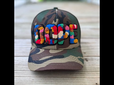 Video of chenille DOPE camouflage trucker hat showing front and side details - Rebel P Customs